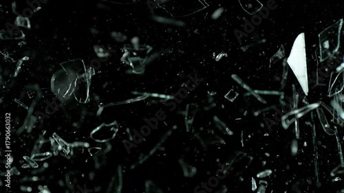 Super Slow Motion Shot of Real Glass Break at 1000 fps Isolated on Black Background.