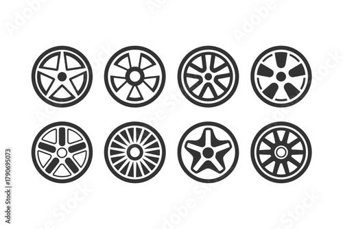 Collection of eight different car wheel designs is displayed against a white background.