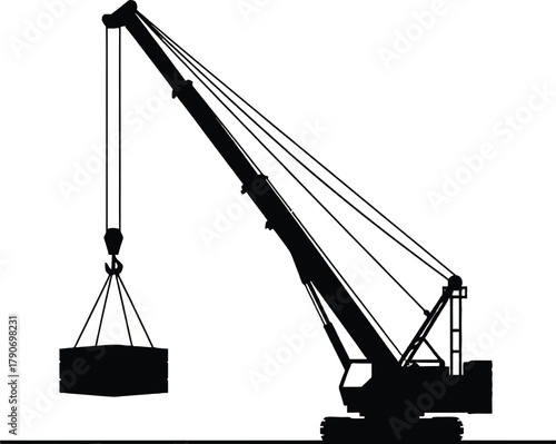 Silhouette of a large construction crane lifting a heavy rectangular object.