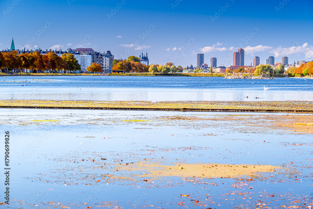 Naklejka premium Autumn morning with panoramic view Copenhagen with skyscrapers over the water, Denmark.