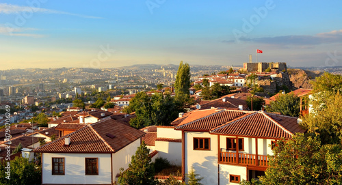 Ankara kalesi - Ankara castle landscape in evening.Turkish flag waving in Ankara Castle.
