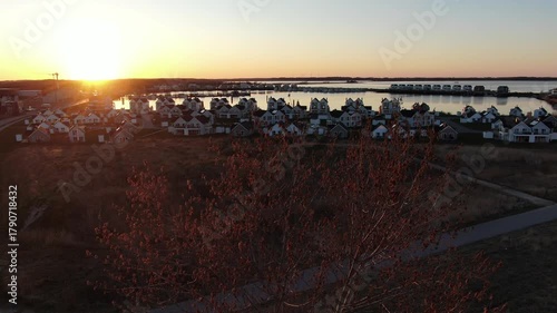 Aerial Sunset View of Olpenitz Harbor - Golden Hour Drone Shot Over Vacation Homes & Marina Baltic Sea Germany