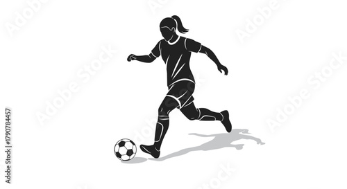 Silhouette of female soccer player kicking ball in action pose