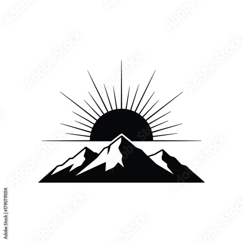 Mountain range with sun rising in black and white