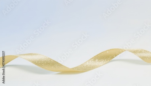 Gold ribbon is shown in a white background