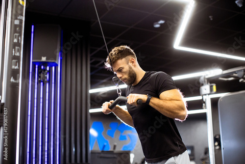 Man strengthens his muscles...