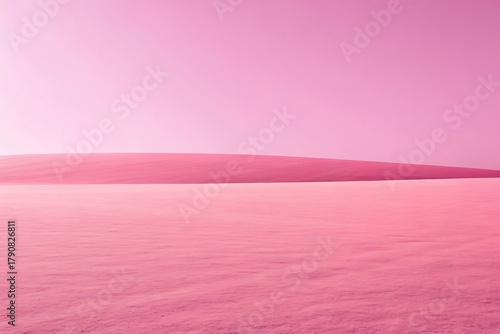 Fototapeta Naklejka Na Ścianę i Meble -  Vast monochromatic pink landscape with subtle dunes under a serene sky