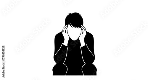 A silhouette of a person holding their head in their hands