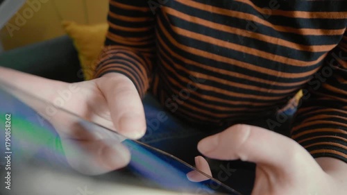 Woman endlessly scrolling social media.