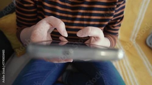 Woman endlessly scrolling social media.