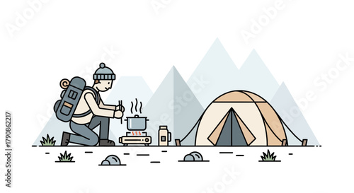 Adventurer Camping Near Towering Mountain Peaks Engaged In Outdoor Cooking