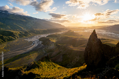 Beautiful sunset in the lush valley of Þórsmörk (Thorsmork) in Iceland’s southern highlands — a dramatic landscape of moss-covered mountains, glacial rivers