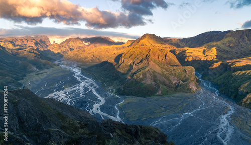 Beautiful sunset in the lush valley of Þórsmörk (Thorsmork) in Iceland’s southern highlands — a dramatic landscape of moss-covered mountains, glacial rivers