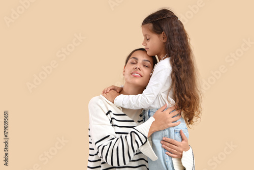 Embracing mother with her l...