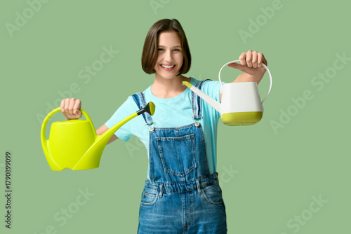 Smiling young woman with wa...
