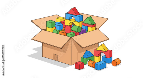 Colorful building blocks in a cardboard box on a light background