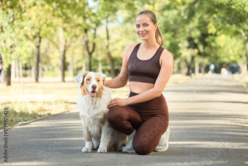 Sporty young woman with Aus...