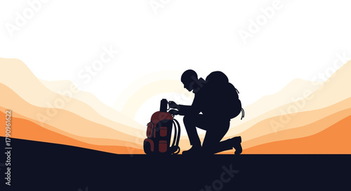 Silhouette Of Hiker Kneeling With Backpack Observing Mountain Landscape At Sunset