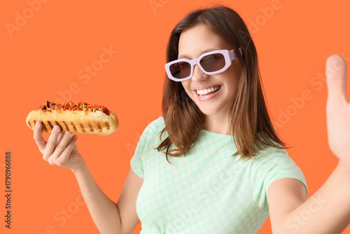 Young woman in sunglasses w...