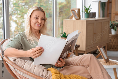 Mature blonde woman reading...