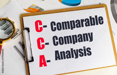 Vászonkép Abbreviation CCA meaning comparable company analysis written on clipboard with f