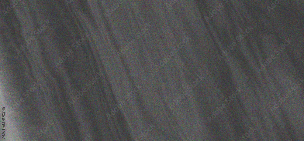 Obraz premium Abstract dark gray texture background with subtle wavy lines
