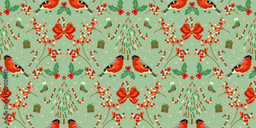 Festive Christmas pattern with red birds, holly berries, bows, tree, candy canes, and gifts on green background. Playful pattern textile, wallpapers and seasonal decor. Vector illustration