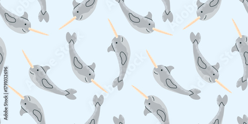 Funny narwhals swim playfully across a blue background, whimsical design ideal for children's decor or fabric