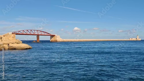 Scenic Dock and Iron Bridge with Lighthouse in Valletta, Malta