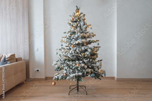 Cozy Living Room with Decorated Christmas Tree and Festive Interior