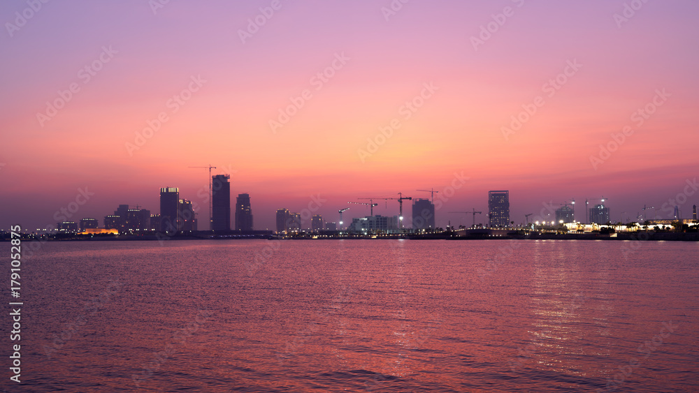 Fototapeta premium the newly developed lusail city with for al sadd tower in the background