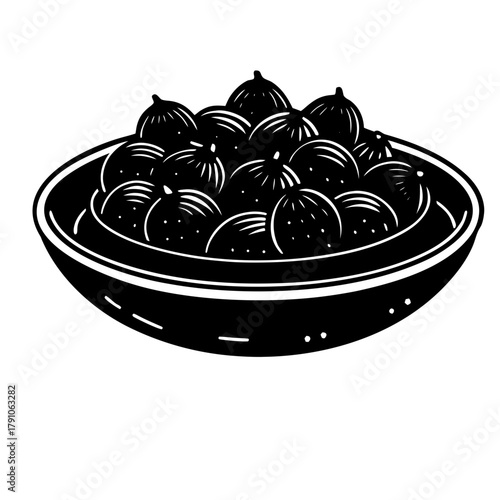 A close up of a black and white dog with its tongue out