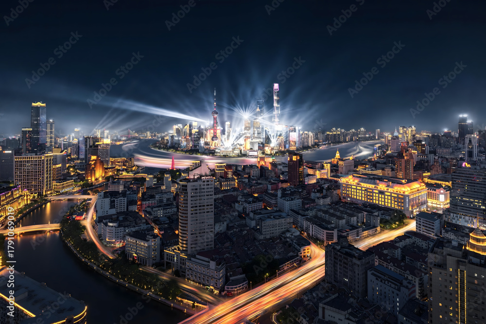 Fototapeta premium Shanghai Skyline Night: Dramatic Light Beams Over Illuminated Modern Cityscape