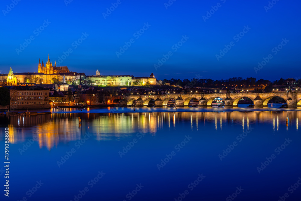 Obraz premium Night view of Charles Bridge, Prague Castle, Vltava river in Prague. Architecture and landmark of Prague, postcard of Prague