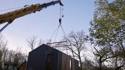 The process of moving a modular home.