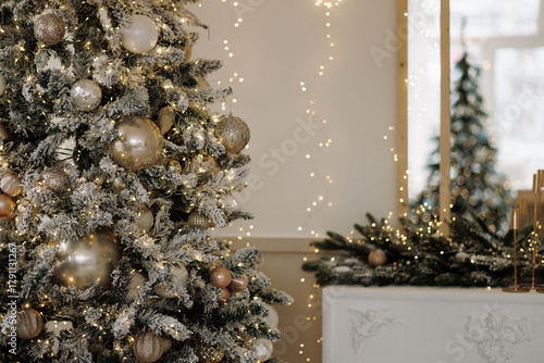 Wallpaper Mural Decorated Christmas tree with golden baubles and fairy lights near white wall and mirror in cozy room. Concept of winter holidays, celebration, luxury home decor. Torontodigital.ca