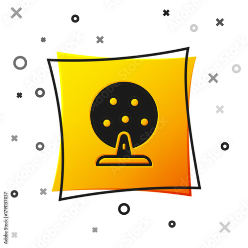 Black Lottery machine with lottery balls inside icon isolated on white background. Lotto bingo game of luck concept. Wheel drum leisure. Yellow square button. Vector