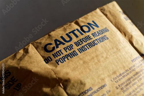 Microwave Popcorn Packaging Cautioning Users With Instructions