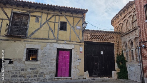 Historic architecture in Tordesillas, Spain with timber framing and arched brickwork