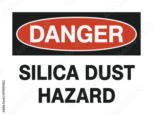 A danger sign warns of silica dust hazard in a workplace.