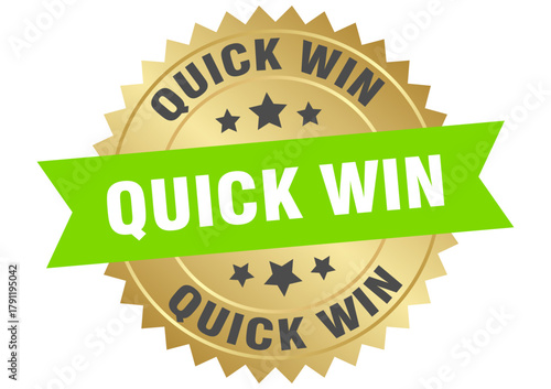 quick win. quick win round green and gold label isolated on transparent background