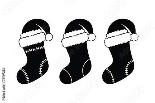 Three black Christmas stockings with white trim and pom-poms are displayed against a white background.