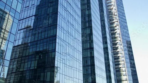Wallpaper Mural Glass skyscrapers reflect the sky and other buildings in a modern architectural scene Torontodigital.ca
