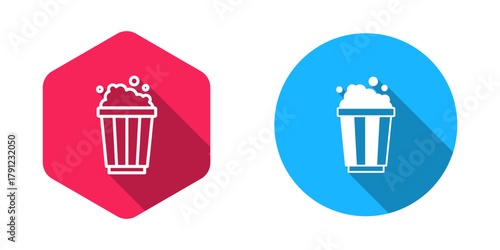 Filled and outline Popcorn in cardboard box icon isolated with long shadow background. Popcorn bucket box. Vector