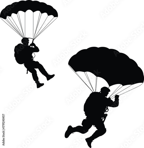 Silhouettes of parachuting figures in mid-air descent, skydivers with open parachutes for adventure, sport, military and aerodynamics themes