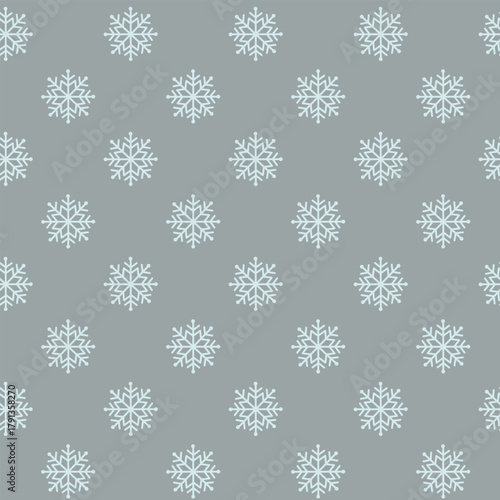 Seamless pattern with snowflakes on grey background. Vector frosty winter background