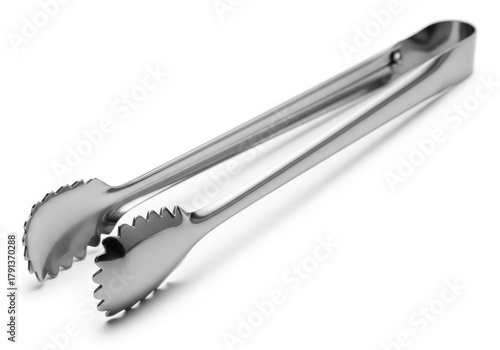 Polished metallic serving tongs with serrated edges rest diagonally on a stark white background