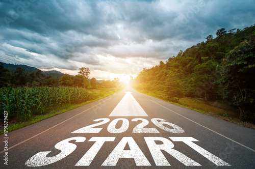 New year 2026 or straight forward concept. Text 2025 written on the road in the middle of asphalt road with at sunset. Concept of planning, goal, challenge, new year resolution.