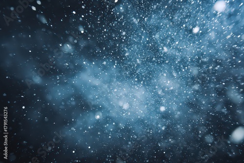 Abstract Sparkling Glitter Dust Overlay in Blue Shades with Bokeh Effects on Dark Background Creating a Magical and Dreamy Atmosphere