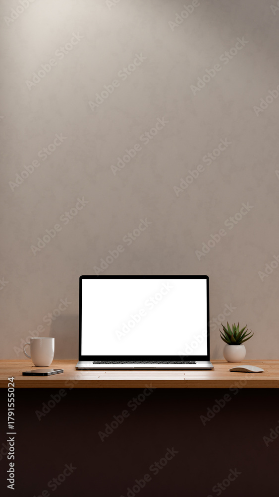 Fototapeta premium Blank screen of laptop for mockup. Workspace with computer, coffee cup, plant and mobile phone. 8k high resolution in Vertical format.